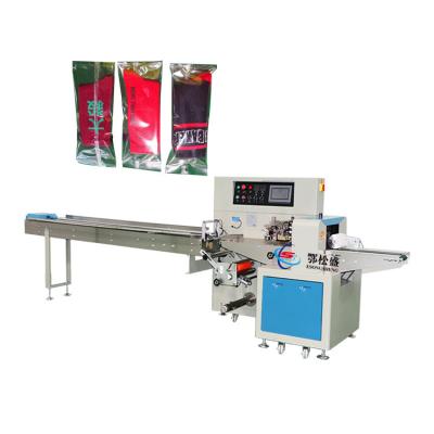 China Automatic Horizontal Christmas Stocking Wrapping Machine Food Wrapping Packing Machine for sale