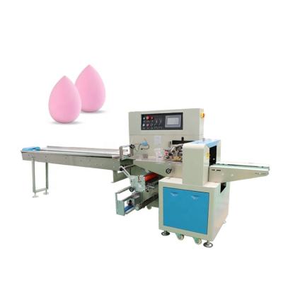 China Horizontal Automatic Food Makeup Facial Sponge Packing Machine for sale