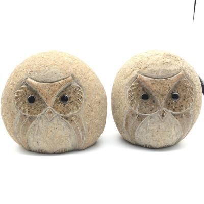 China China Wholesale Retail Garden Outdoor Carving Ornaments Natural River Pebble Paving Stone Hand Carved Flower Cutting Machining Owl for sale