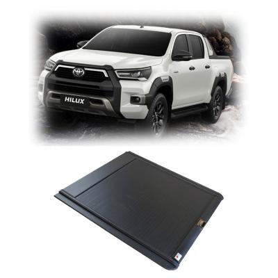 China Waterproof Aluminum Roll Up Truck Bed Tonneau Cover Roll Up Cover For Toyota Hilux Adventure 2021/2022 for sale