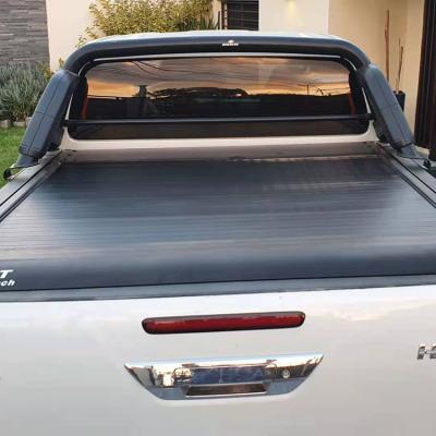 China Factory Direct Sale Waterproof Hard Pick Up Electric Truck Bed Tonneau Cover For Toyota Hilux Adventure /Vigo/Rocco/Revo for sale