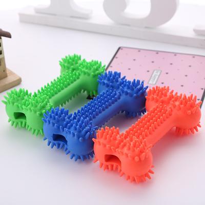 China Viable Newly Designed Bone Shape Teeth Cleaning Resistant TPR Pet Toy Rubber Bite Dog Toy for sale