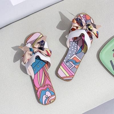 China Lightweight Casual Flat Shoes Bow Color Matching Slippers Light Up Vacation Shoes Women Outside Shoes Ribbon Sandals for sale