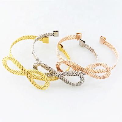 China CLASSIC trendy metal butterfly hollow braided tubular bracelets for women with adjustable openings for sale