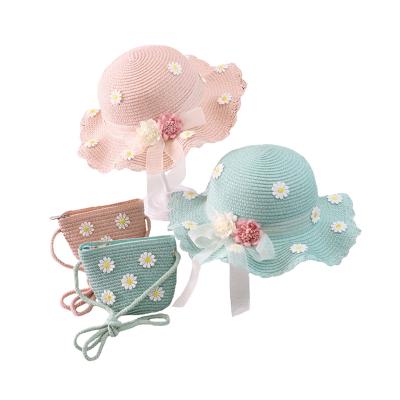 China 2022 Wholesale Eco-friendly Wide Brim Summer Cute Straw Hat For Kids Beach Sun Hat And Bag Set for sale