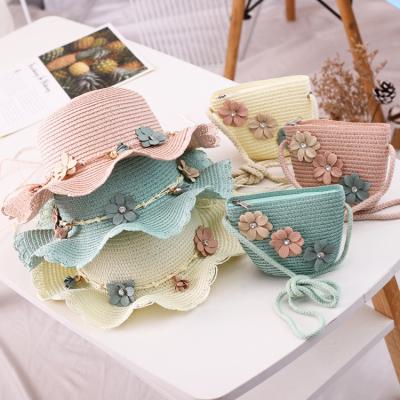 China 2022 New Children Summer Eco-friendly Cute Straw Hat For Girl Flower Beach Hat And Bag Bohemian Set for sale