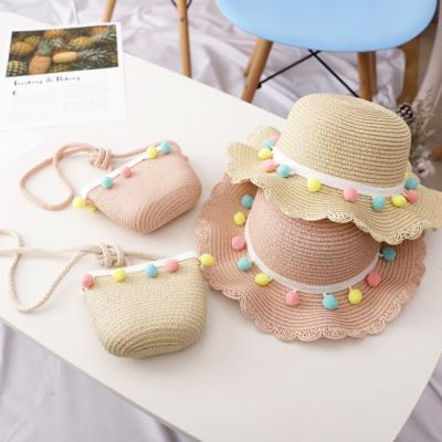 China Kids Eco-Friendly Two Piece Sets Colorful Pom Pom Ball Lace Sun Straw Hats For Girls Sun Protection Hat And Bag Set for sale