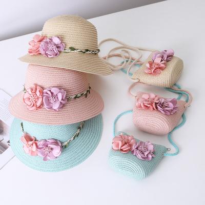 China Kids Eco-Friendly Straw Hat Kids Cute Bohemian Flower Summer Beach Hat For Girls Sun Protection Hats And Bag Set Gift for sale