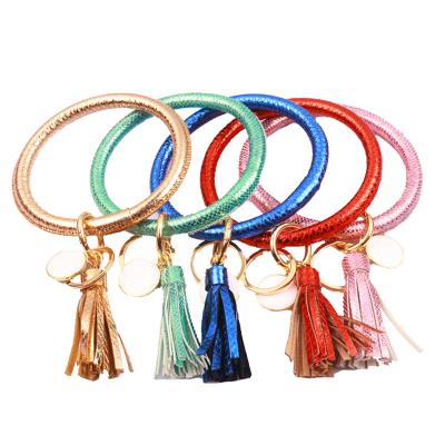 China Eco-Friendly Key Ring Leather /Silicone Circle Keychain Bracelet Keychain Tassel Key Holder Chain Bracelet Eco-Friendly Great For Women Girls for sale