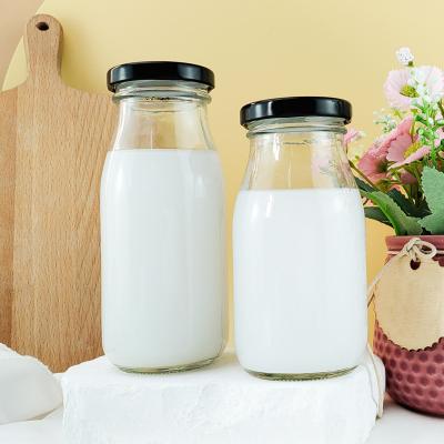 China Wholesale 200ml 220ml Dairy Milk Bottle Glass Reusable Beverage Containers for Juice, Yogurt, Smoothies, Honey, Tomato Sauce for sale