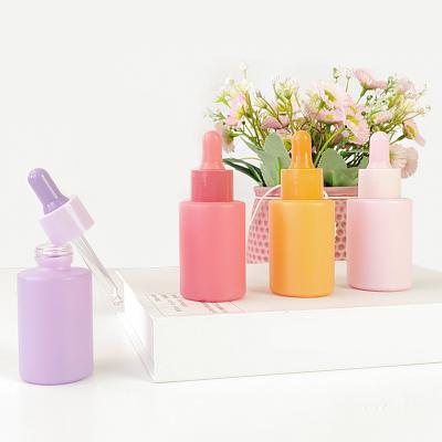 China Wholesale Cosmetic Luxury 30ml Essential Oil Eye Essence Glass Dropper Bottles Macaron Colors With Dropper And Cap for sale