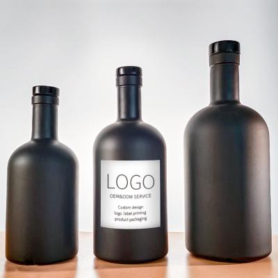 China Nordic Style Wholesale 50ml 100ml 200ml 375ml 500ml 750ml 1000ml Matte Black Glass Liquor Beverage Bottle For Vodka Rum Whiskey With Cork for sale