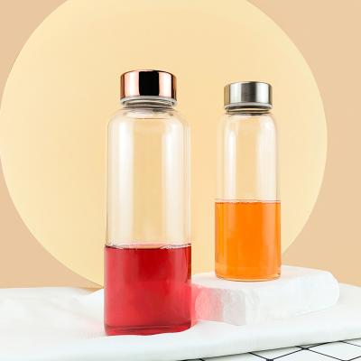 China Wholesale Clear Reusable Drinking Bottle Heat Resistant High Borosilicate Glass Water Bottle Drinking Bottle With Leak Proof Caps for sale