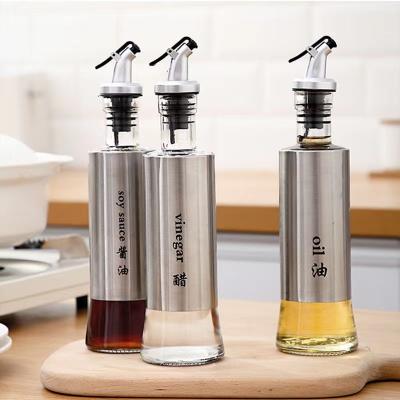 China Household Products Factory 200ml 300ml 500ml Glass Kitchen Sauce Cooking Sauce Olive Oil Dispenser Bottles With Stainless Steel Liner for sale