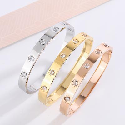 China Custom Environmental Protection Stainless Steel O Shaped Zircon Screw Bracelet Three-color Gold Plated Screw Bangle Bracelet for sale