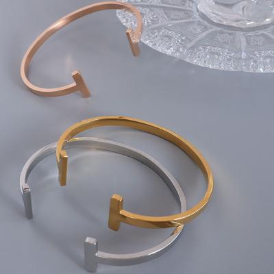 China Fashion personality bracelet 18k popular high quality geometric t-shaped open gold plated bangle for sale