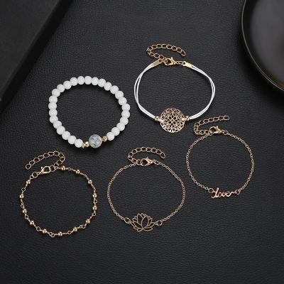 China Factory direct sales environmental protection Five-piece letter Lotus Jewelry Fashion Ceramic Beads geometric hollow pendant bracelet for sale