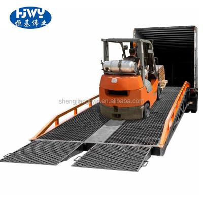 China Direct Sales Hydraulic Forklift Easy Operation 12 Ton Factory Mobile Yard Car Loading Ramps for sale