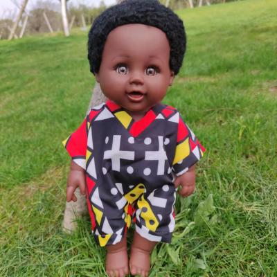 China 12 Inch Educational African Clothing Print Birthday Gift Boy Doll for sale