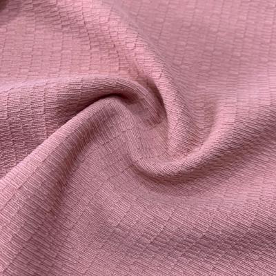 China KK2670 Stretch Polyester Spandex Pleat Jacquard Knitting Fabric for sale