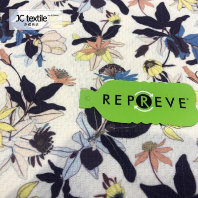 China Stretch eco-friendly 100%polyester rpet flower recycled dobby check fabric for sale