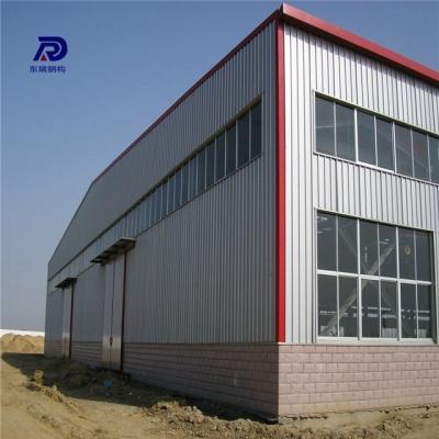 China Steel Fabricated House 40 Years Warranty Wind Resistant Steel Construction Warehouse for sale