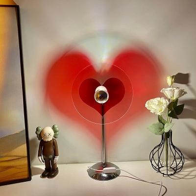 China Portable Nordic Creative Plug-in Colorful Desk Lamp Bedside Atmosphere Heart Lamp Sunset USB Luxury Hotel Table Lamp for sale