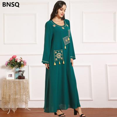 China CUBEAR Breathable High Quality Islamic Clothing Tassel Embroidery Green Color Gold Muslim Women Dress With Pocket for sale