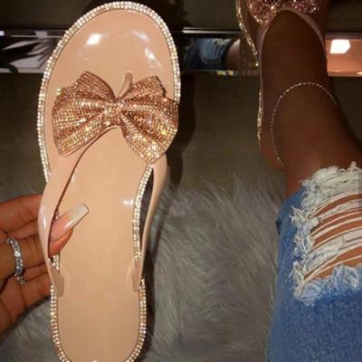 China Fashion Trend Luxury Designer Flat Plus Size Bow Diamond Ladies Beach Summer Women Jelly Slippers for sale