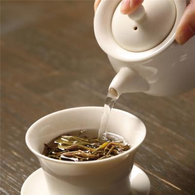 China 357 gram compressed tea tea puer pancake top brand tea finding concession brand agency distributor for sale