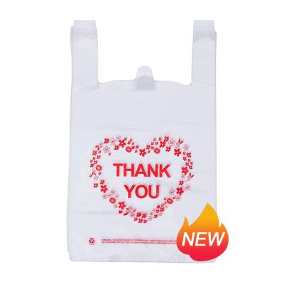 China Recyclable White Sturdy Handled Goods Bags Supermarket Standard Size Thank You Shop Store Plastic T-Shirt Bag Tote Bag Custom for sale