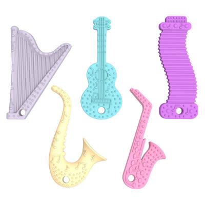 China hot sale BPA free silicone Teether 100%food grade soft silicone molar stick unique musical instrument train Teether toys for baby for sale