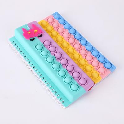 China Wholesale Multifunctional A5 Relaxing Silicone Pencil Case Cover Cartoon Unicorn Stir Spiral Notebook Push Noise Bubble Stirrer Notebook for sale