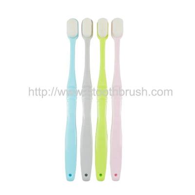 China Disposable Micro Nano Extra Soft Toothbrush With Dust Cover For Family Use for sale