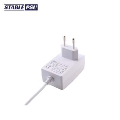 China Fast Charging Speed White Color CE Certificate PSU 12V 2000mA Wall Mounted Power Adapters for sale