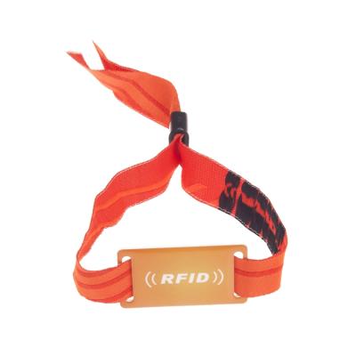 China Disposable Waterproof / Waterproof Woven Fabric Adjustable Sports Rfid Wristband Nylon Nfc Smart Wristband for sale