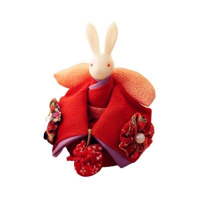 China Creative cute rabbit home wedding Mengmeng stack doll decoration living room decoration music box plush practical wedding gift for sale