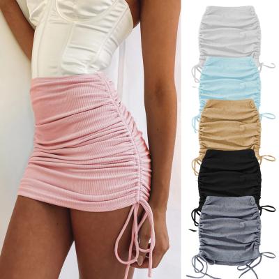 China 2022 Summer New Fashion Side Hip Women's Soild Sexy Anti-static Color Drawstring Skirts for sale