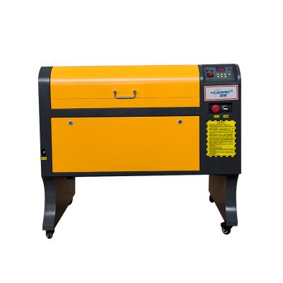 China 3D Wood Laser Cutter CO2 Laser Engraver 50W Board Laser Acrylic Engraving Machine 6040 for sale