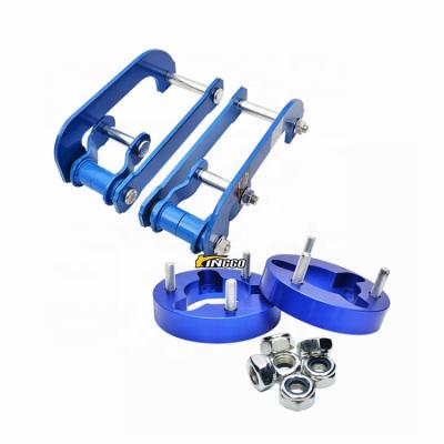 China 2 inch raised & Comfortable Aluminum Front Strut Spacer And Rear Lift Shackles For Navara D40 2006-2014 for sale