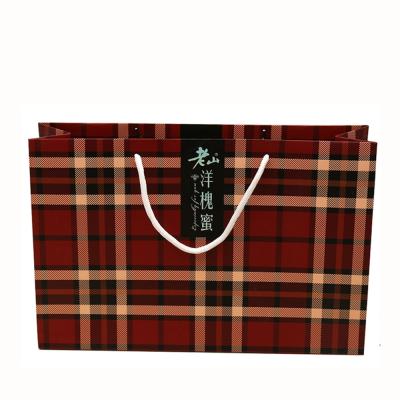 China Recyclable wholesale fabric paper bags for clothing printing shopping bag murah, gift packaging bag for sale