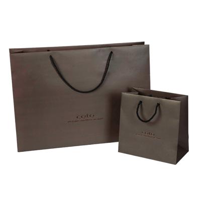 China Recyclable Wholesale Holiday Use Kraft Paper Bag Christmas , Printed Paper Shopping Bag for sale