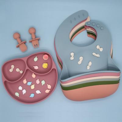 China Custom Antibacterial BPA Free Silicon Waterproof Bib With Catcher Printed Silicone Bibs for sale