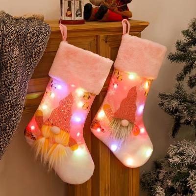 China Christmas Ornament Christmas Decoration Returns Fine Workmanship For Stair Railing New Year Pale Pink Santa Stockings for sale