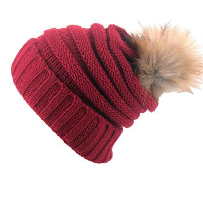 China COMMON Personalized Female Fur Hicker Ball Cap Bobble Warm Hat Winter Woolen Knitted Hat for sale