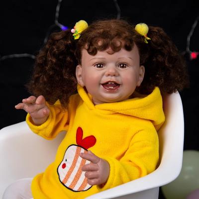 China Changeable Dressing 27 Inch Smile Cloth Body Baby Charm Reborn Dolls Hand Paitning Realistic Rooted Hair Newbron Doll Toys Children Birthday Gift for sale