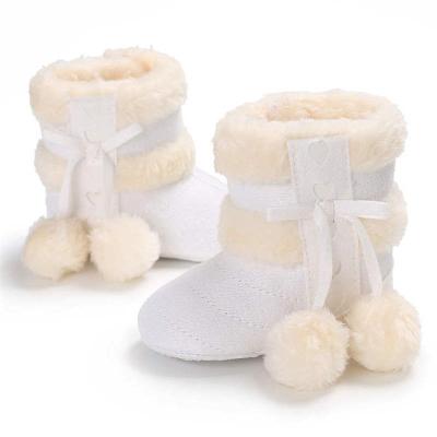 China Best Winter Baby Snow Boots Fluff Ball Warm Ball Flat Cotton Toddler Indoor Home Shoes for sale