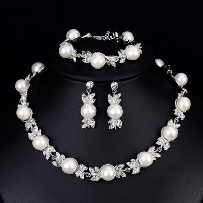 China Vintage Pearl Rhinestone Wedding Bridal Jewelry Sets For Women Crystal Long Earring Necklace Bracelet Jewelry Set for sale