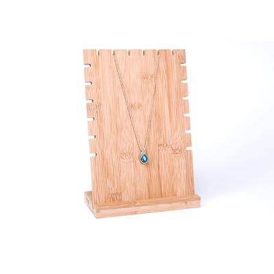 China Luxury Eco-Friendly Bamboo Wood Logo Jewelry Display Stand Necklace Custom Made for sale