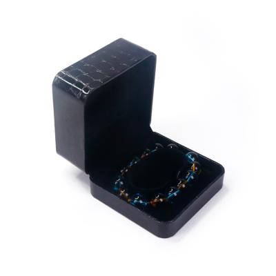 China Jewelry packaging black plastic Kraft paper morocco velvet liner jewelry packaging bracelet box for sale